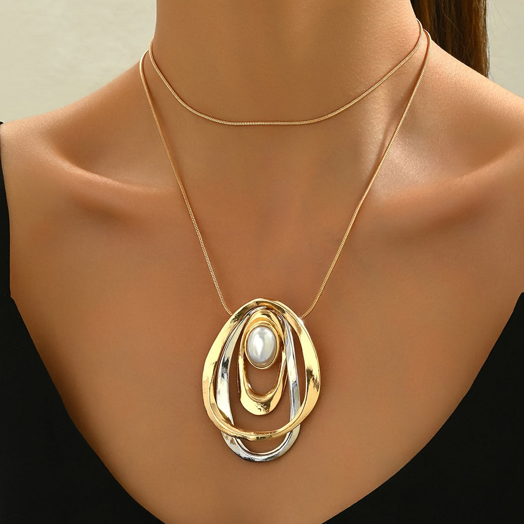 Model wearing the statement pendant necklace