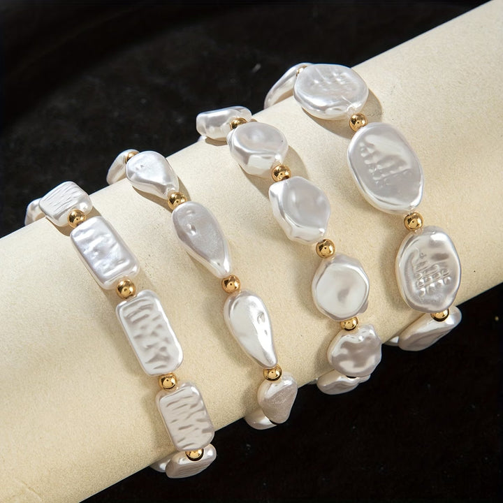 Close-up of one bracelet showing its varied pearl bead sizes