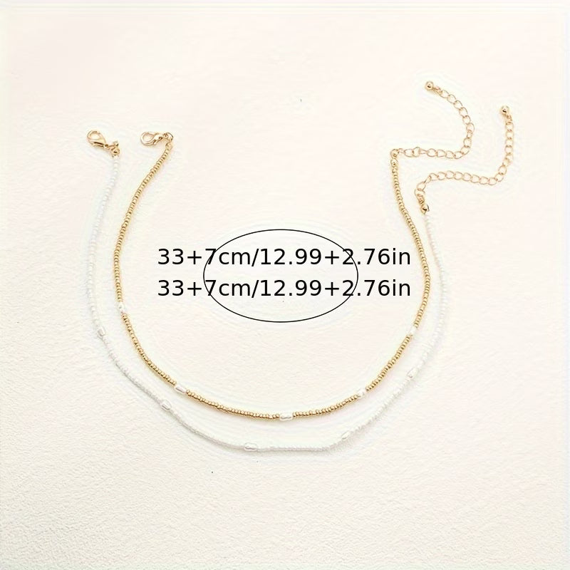 Necklace set draped over a stand to show all layers together