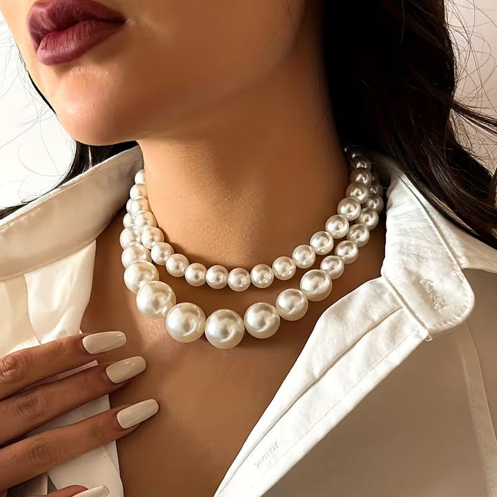 Close-up of the pearl strands and clasp detail