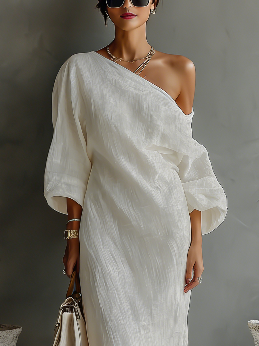 Ivory Off-Shoulder Flowing Dress — close-up view