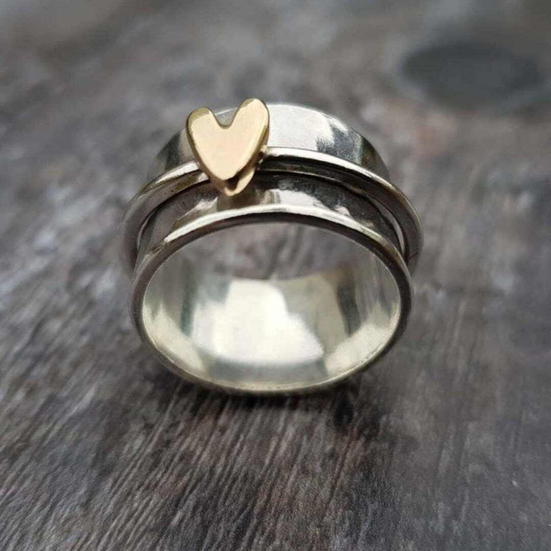 Main shot of the vintage silver and gold heart ring