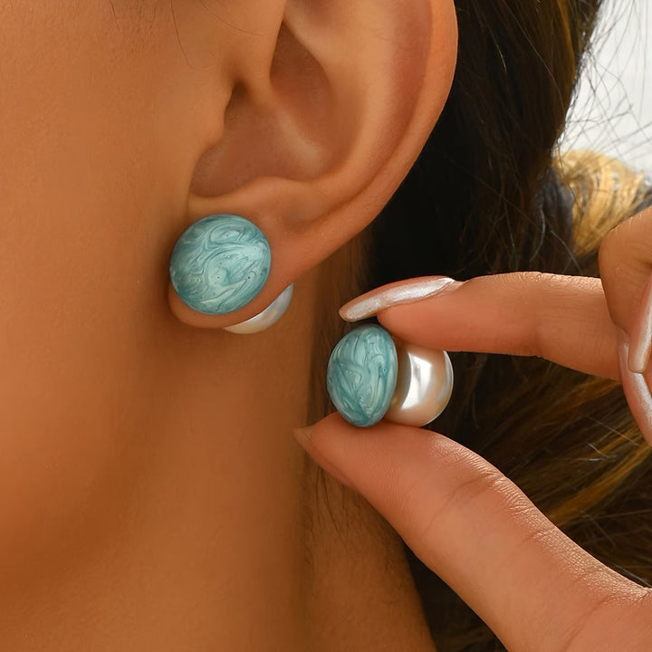 Main shot of the two-in-one pearl and turquoise stud earrings