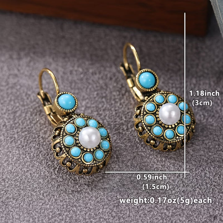 Lifestyle shot of the earrings styled with an outfit