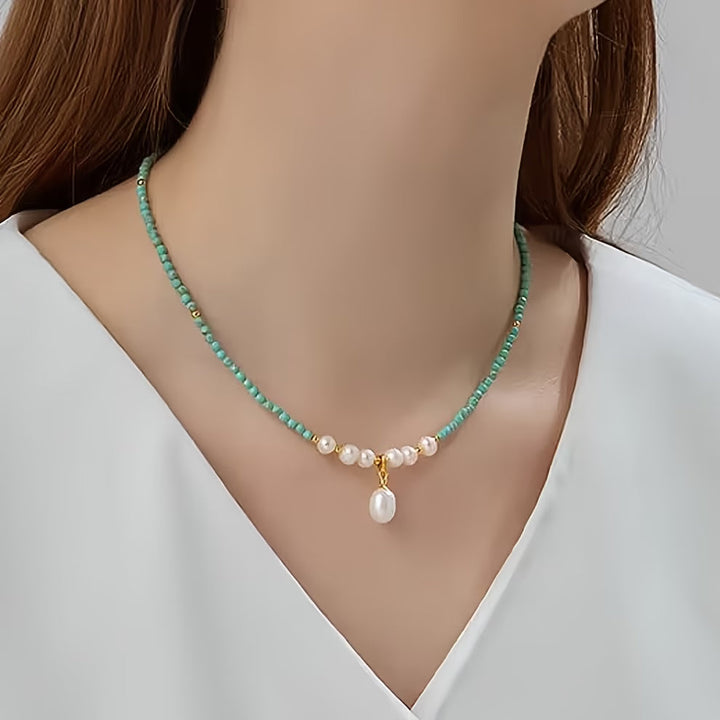 Necklace draped over a stand to display its length