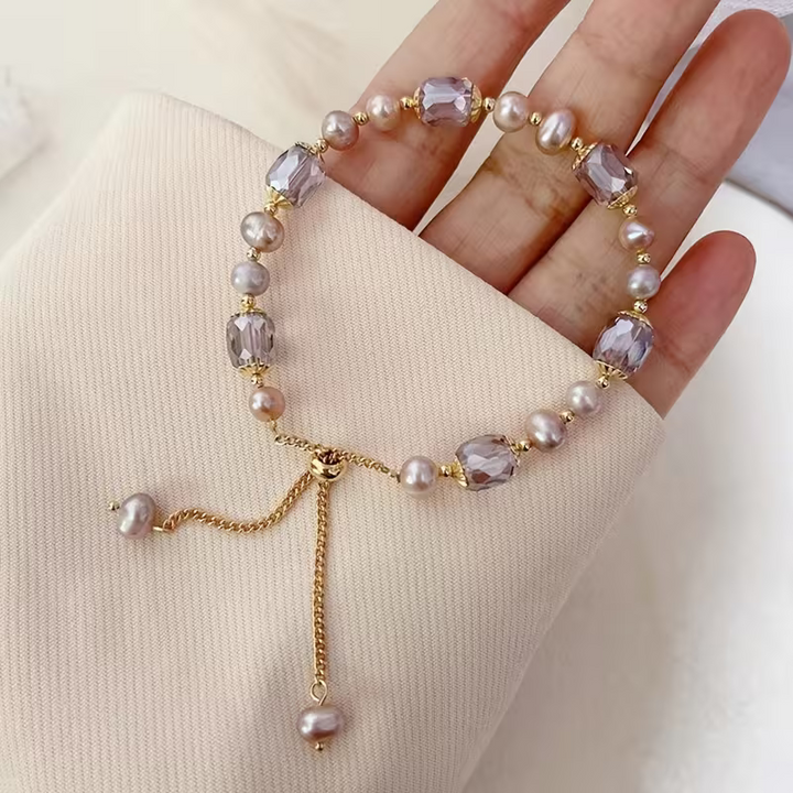 Close-up of the champagne-hued pearl beads