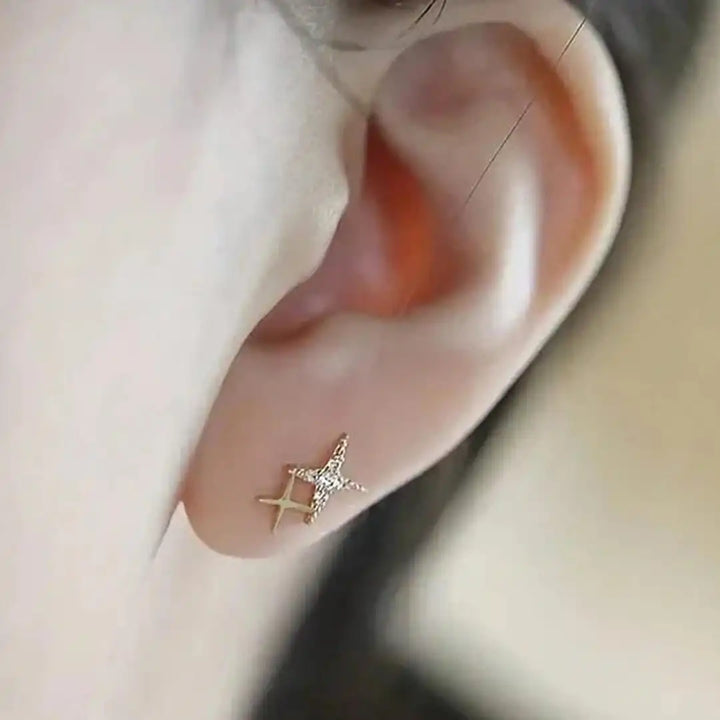 Earrings worn on a model's ear