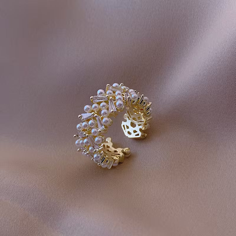 Premium pearl leaf ring shown from the front on a plain background