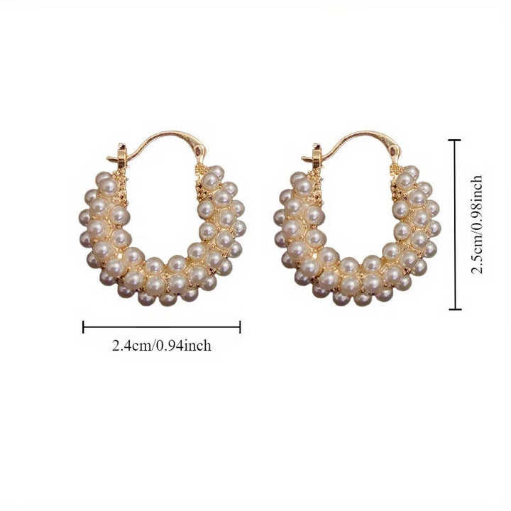Pearl hoop earrings shown from a front-facing angle