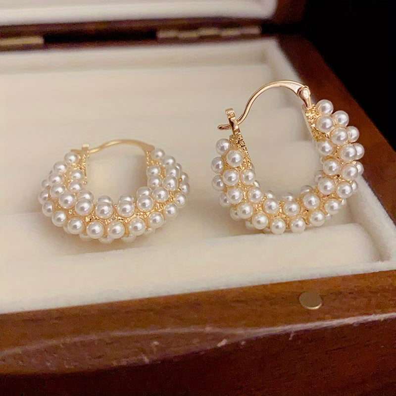 Close-up of the pearls strung along the hoop