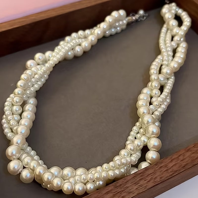 Close-up of the large pearls used in the statement necklace design