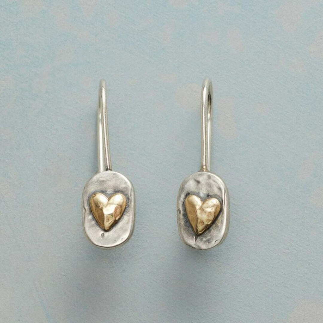 Main shot of the vintage gold inlaid heart earrings