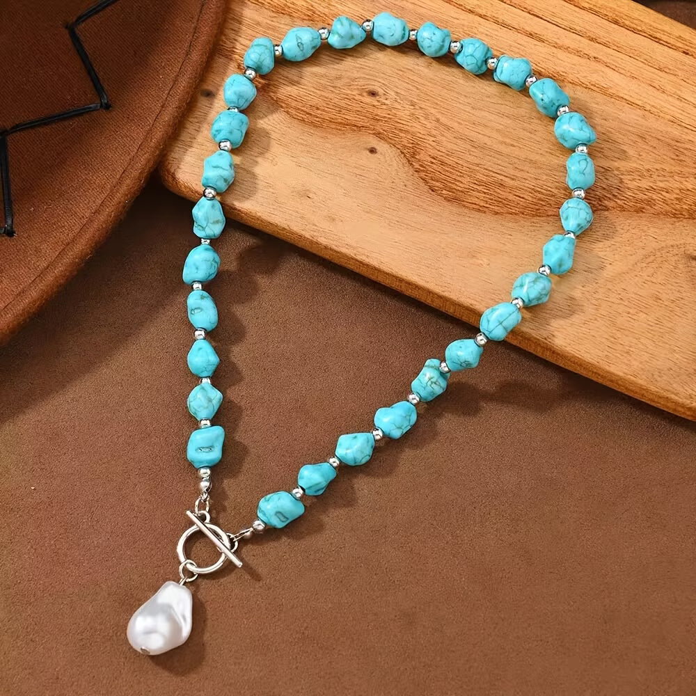 Close-up of turquoise beads alternating with pearls