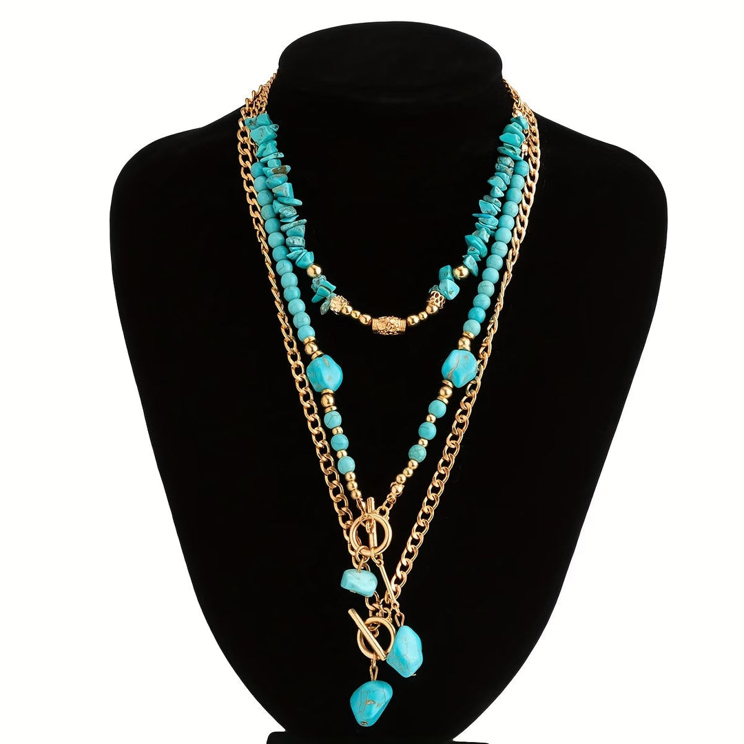 Model wearing the statement turquoise necklace