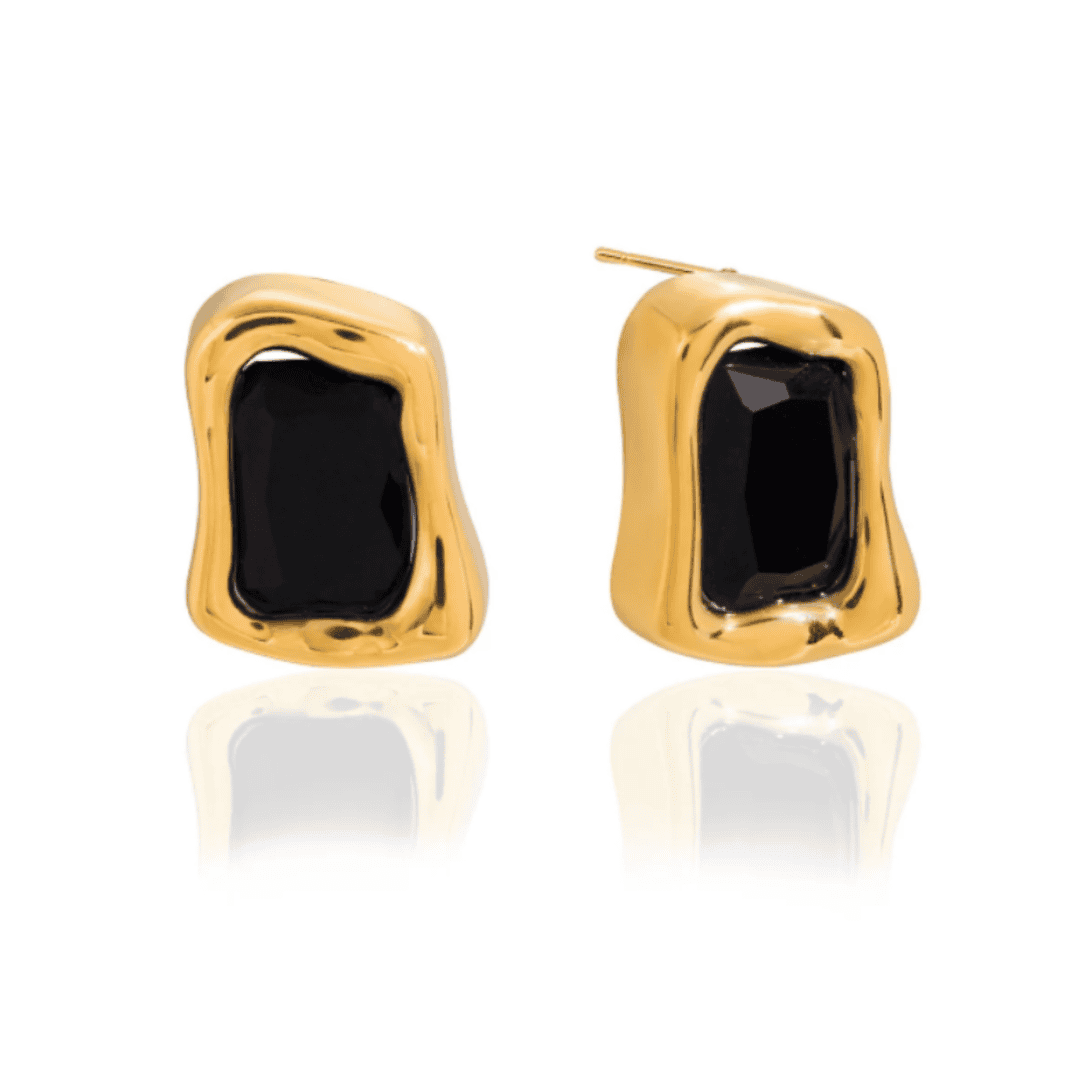 Both earrings displayed together on a jewellery tray