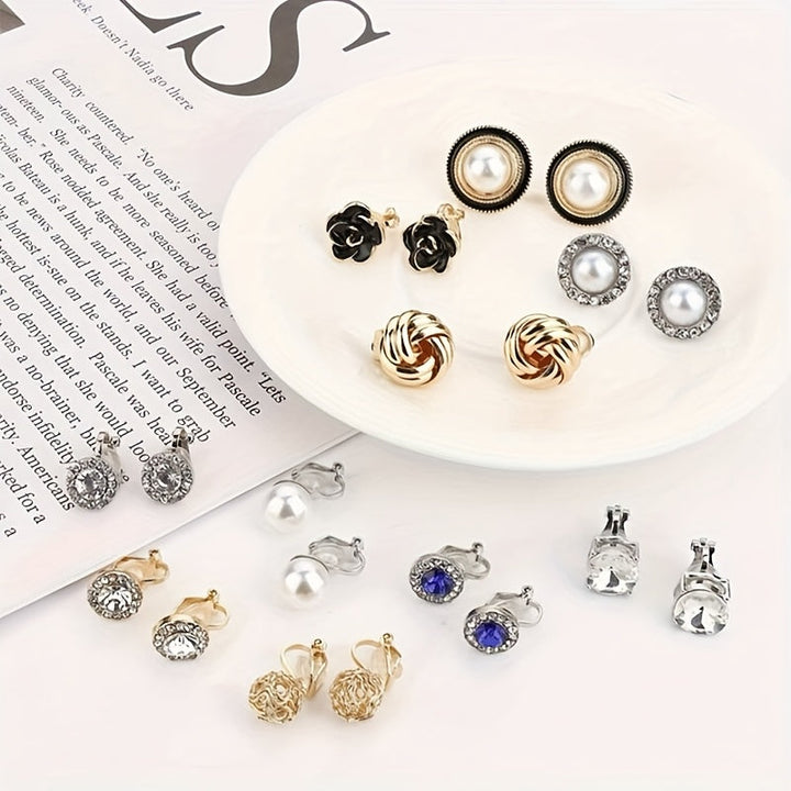 Set of ten pearl clip earrings arranged on a white background