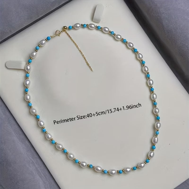 Lifestyle photo of the bracelet stacked with other pieces
