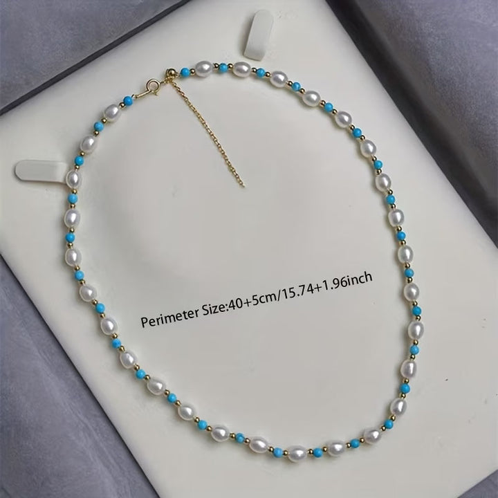 Lifestyle photo of the bracelet stacked with other pieces