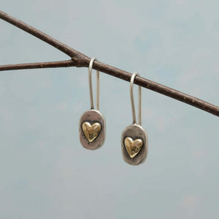Close-up of the heart charm inlay detail