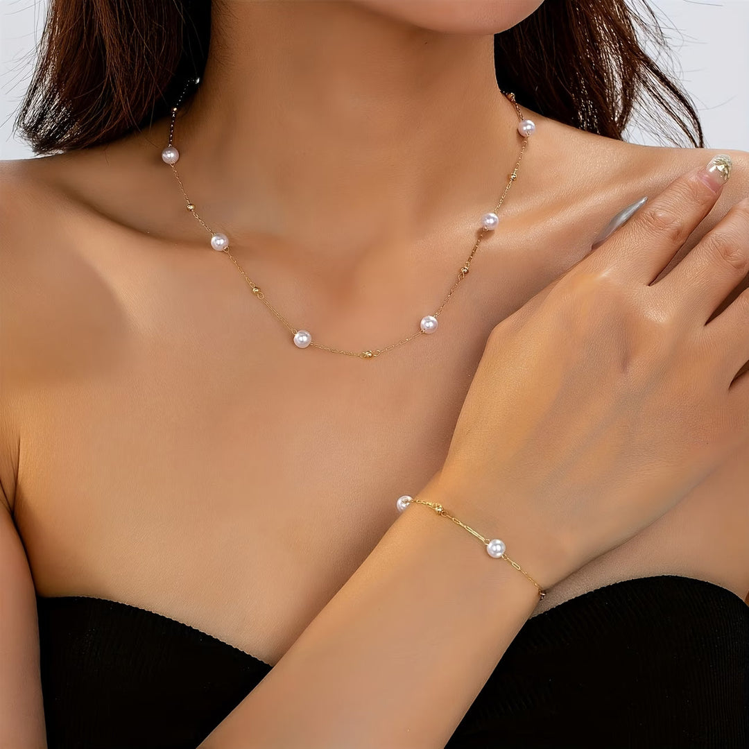 Dainty pearl chain jewellery set showing necklace and earrings together