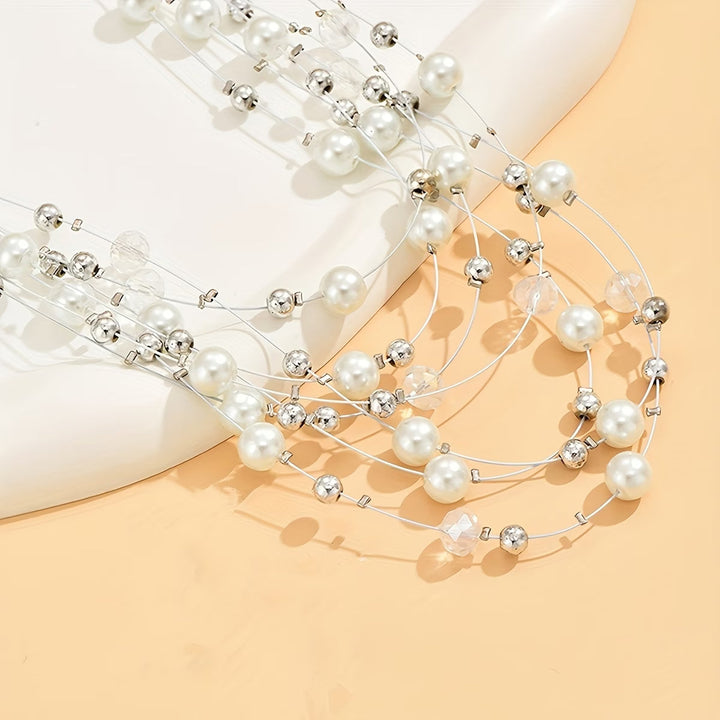 Detail of the clasp and layering chain