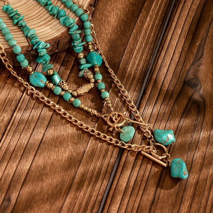 Statement turquoise necklace displayed on a plain background