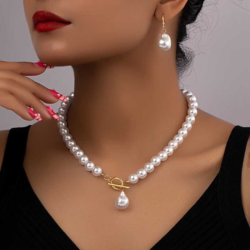 Vintage-style pearl jewellery set showing necklace and earrings together