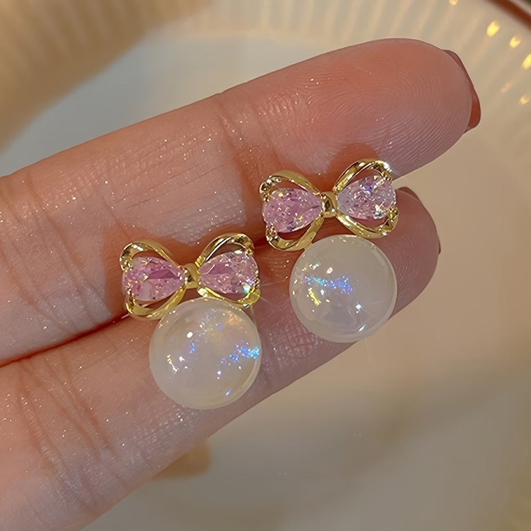 Main shot of the rosé sapphire pearl stud earrings