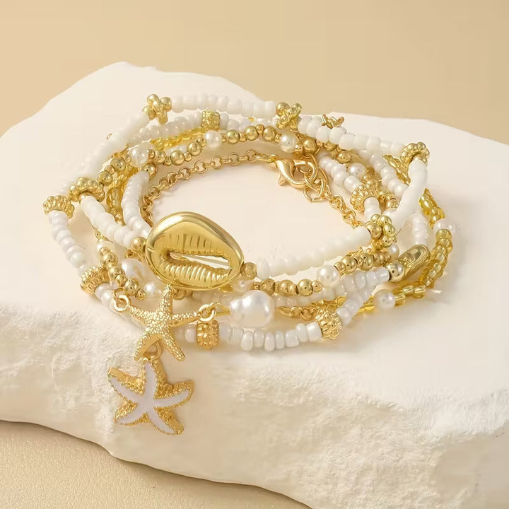 Close-up of the pearl beads on one bracelet from the set