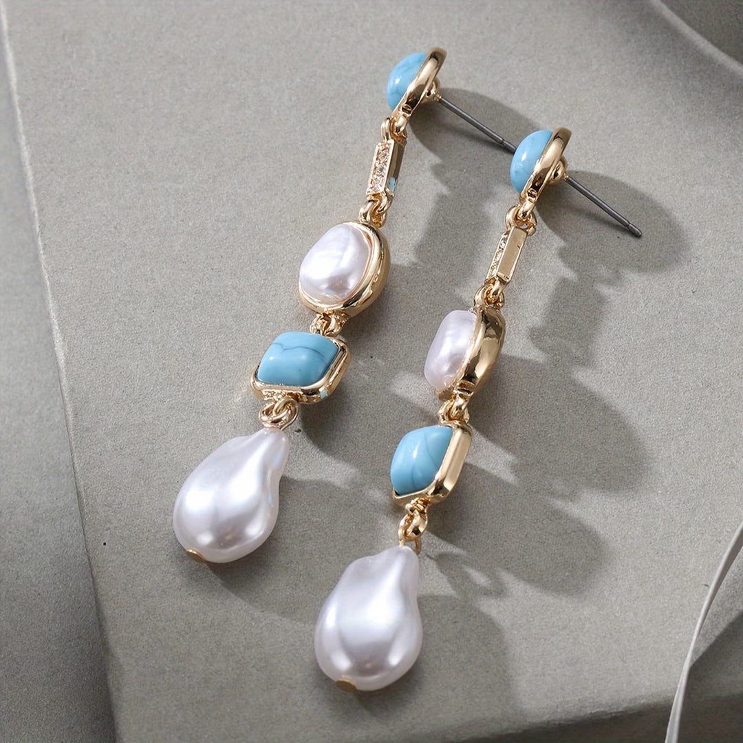 Earrings worn on a model's ear