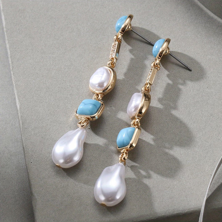 Earrings worn on a model's ear