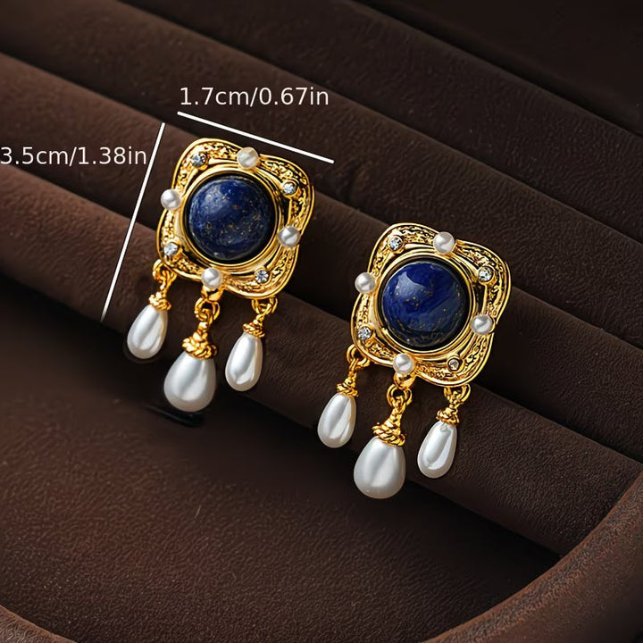 Side profile showing the earring's cascading drop design