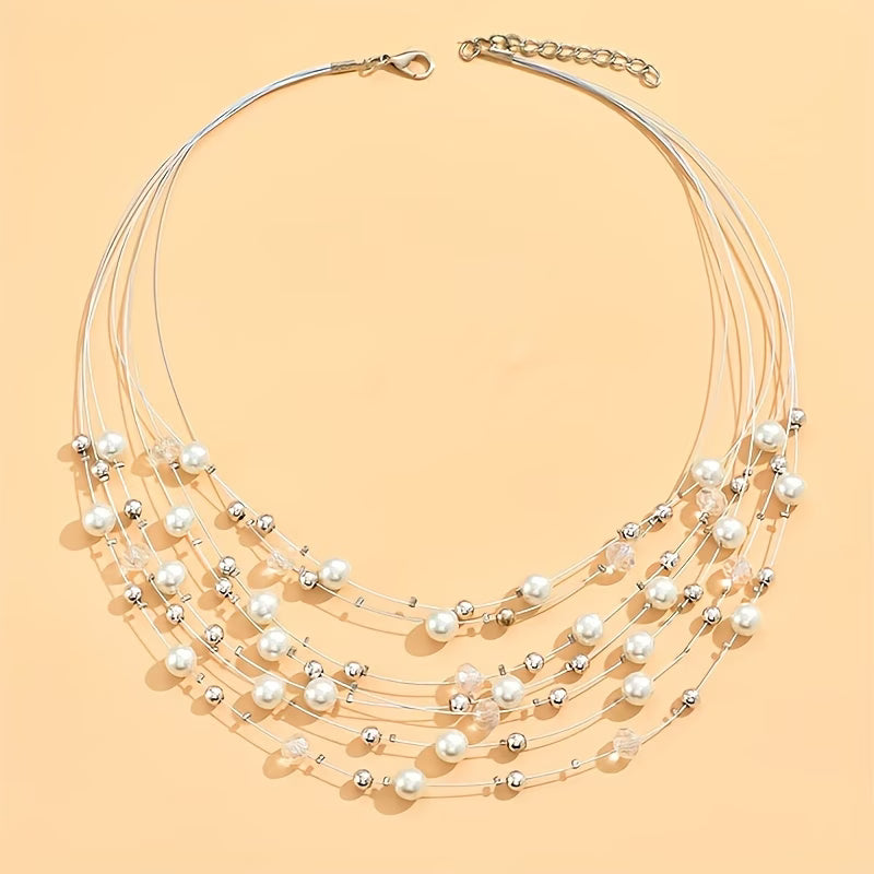 Necklace piece laid flat showing all layers