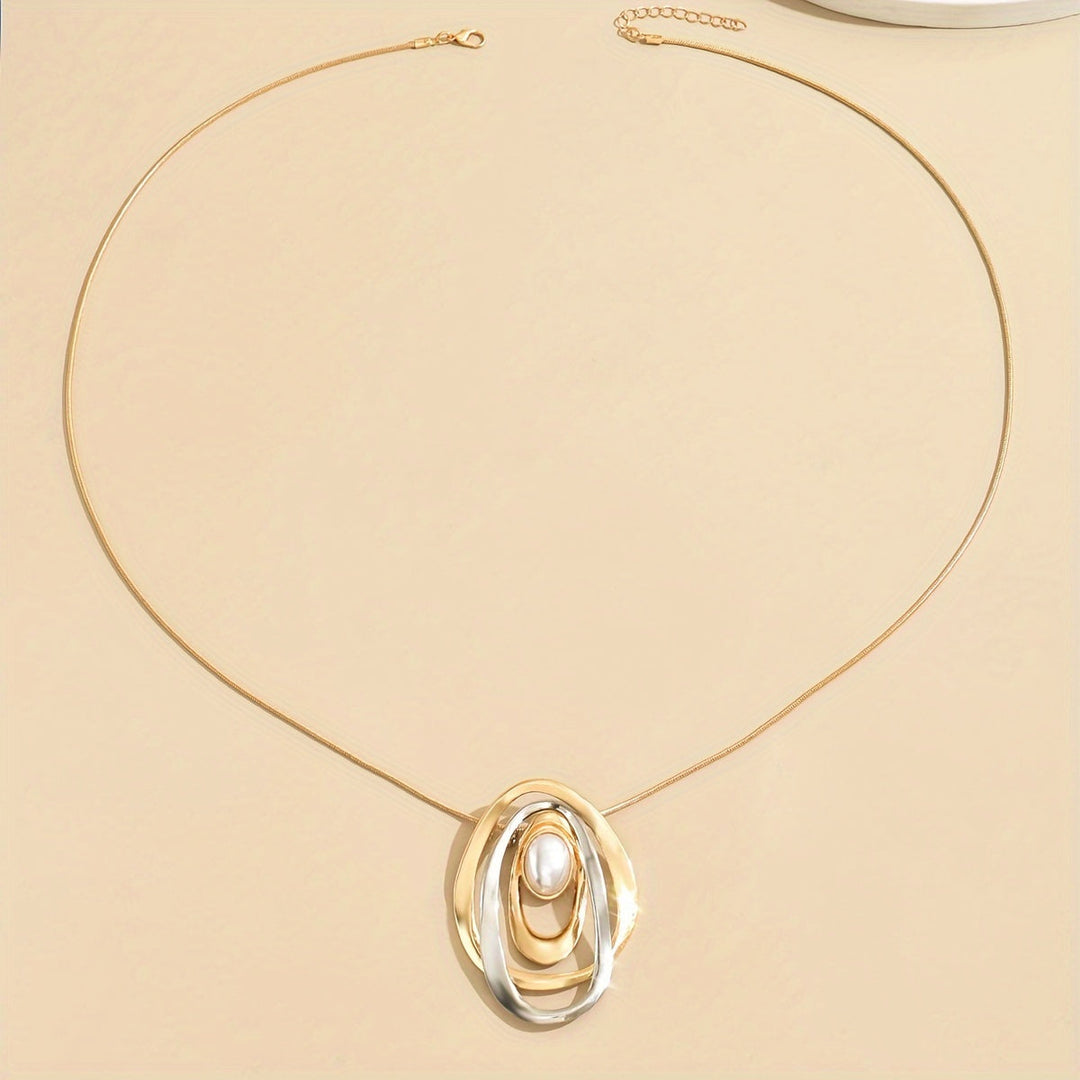 Necklace draped over a stand to show the pendant drop
