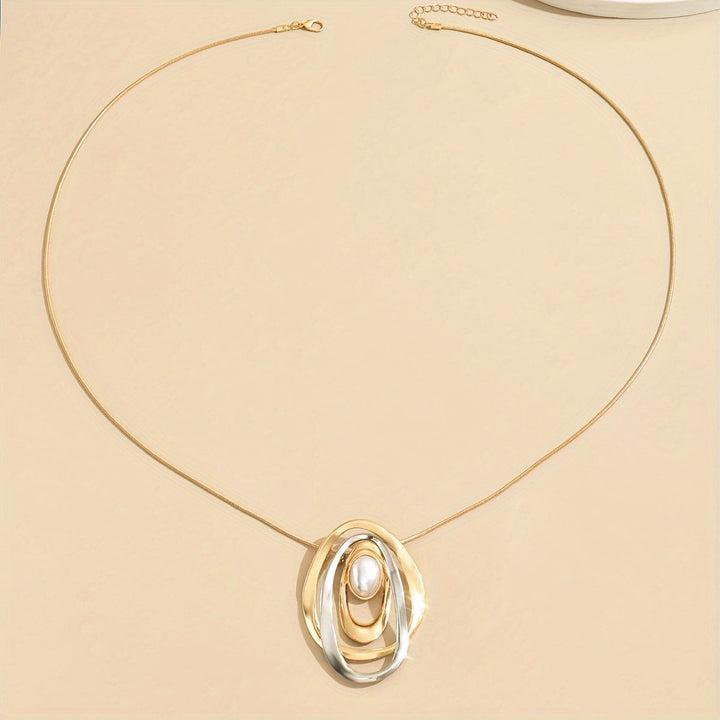 Necklace draped over a stand to show the pendant drop