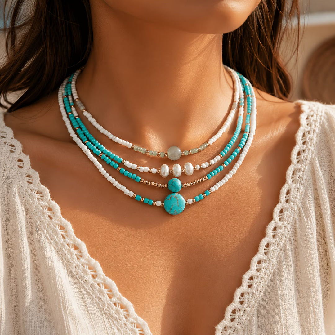 Pearl and turquoise beaded bracelet set displayed as a stack