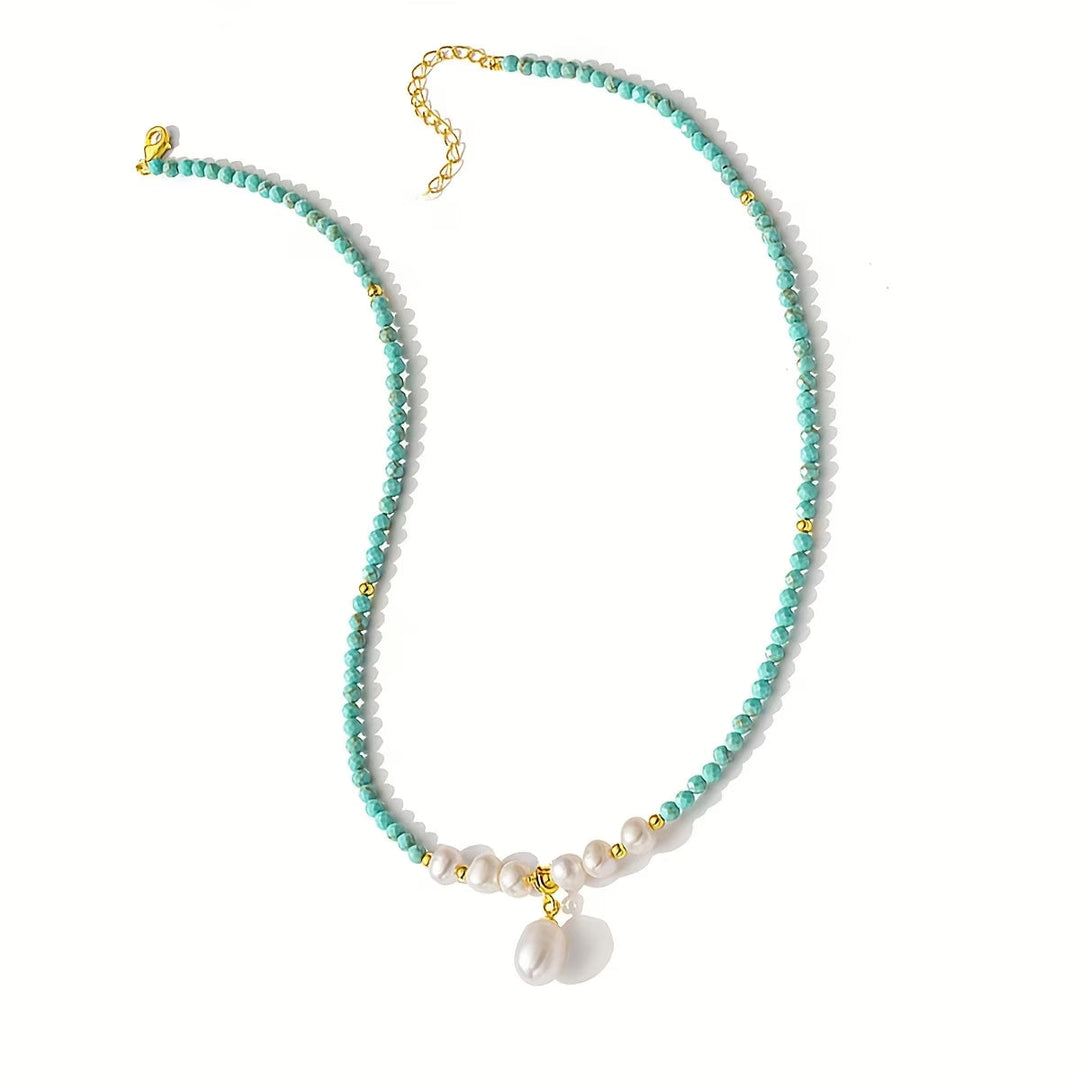 Model wearing the minimal turquoise and pearl necklace