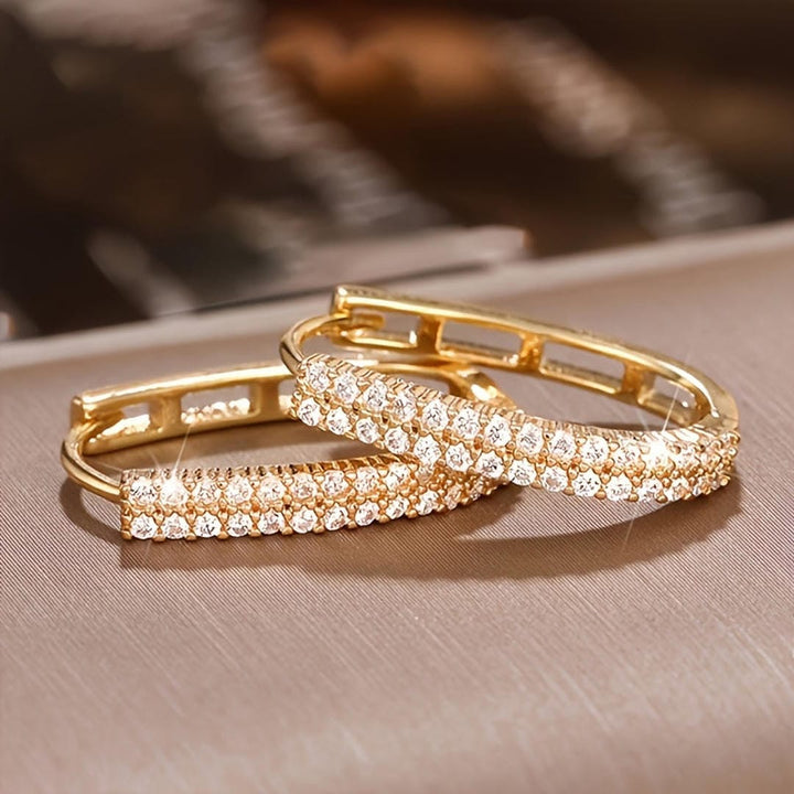 Main shot of the circular zirconia drop earrings