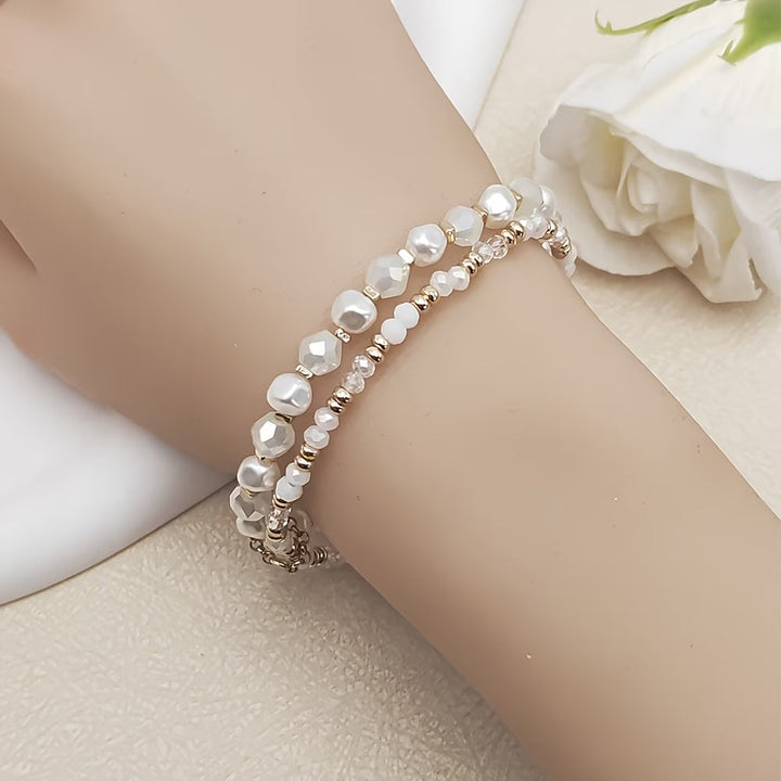 Set worn stacked on a model's wrist