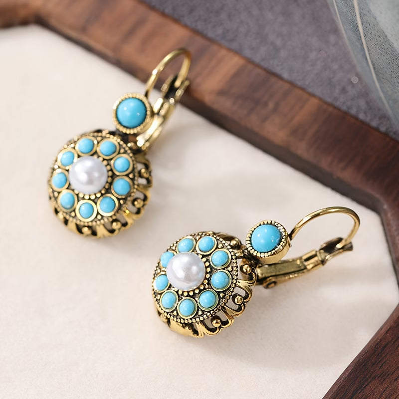 Main shot of the pearl bloom and turquoise drop earrings