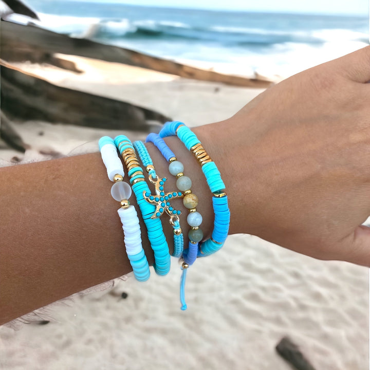 All five stackable bracelets laid out together
