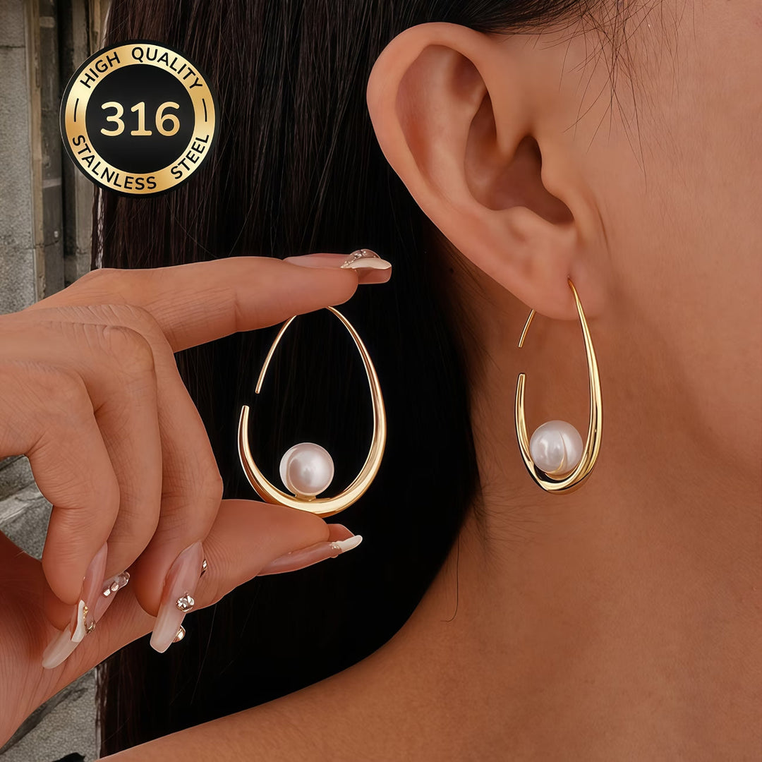 Close-up of pearls set along the crescent hoop earring edge