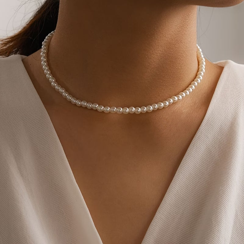 Classic pearl necklace laid flat showing the full strand length