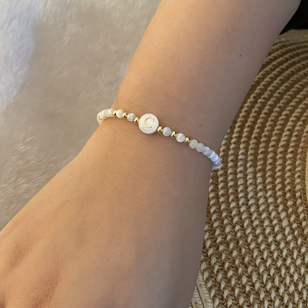 Bracelet displayed alongside its gift packaging
