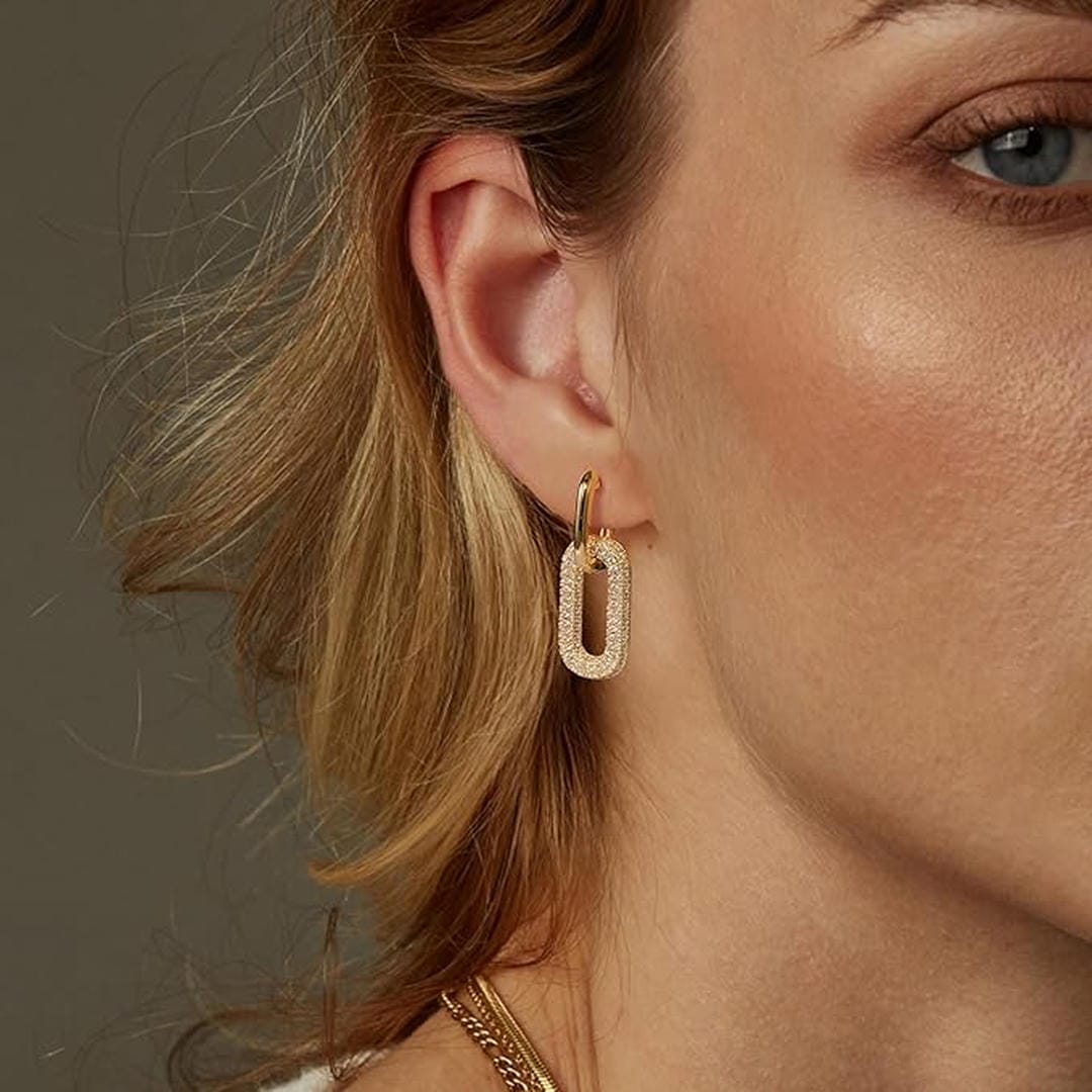 Earrings worn on a model's ear