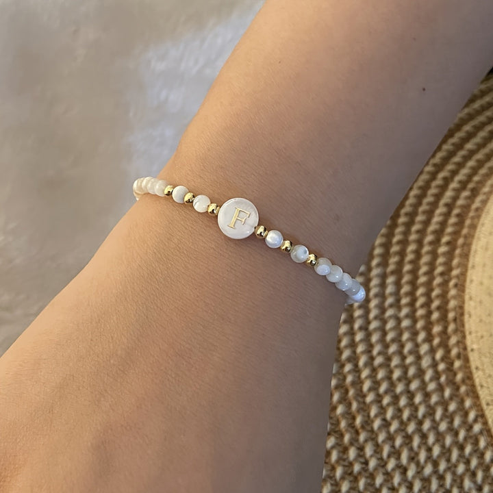 Top-down view of the bracelet coiled on a flat surface