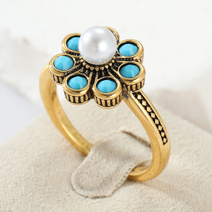 Main shot of the floral turquoise pearl statement ring