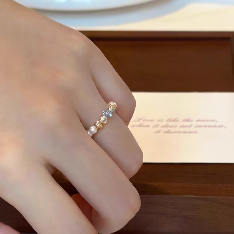 Ring worn on a model's hand