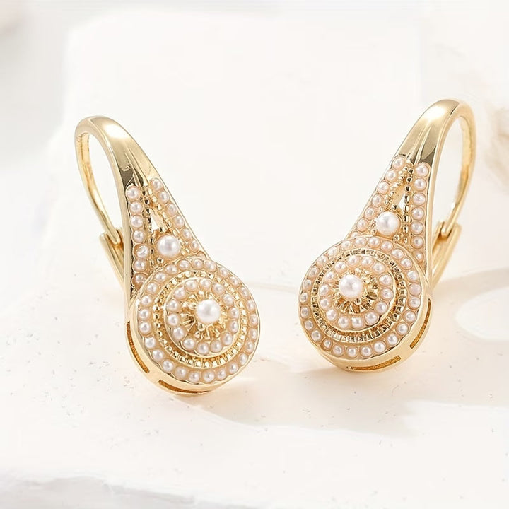 Model wearing the pearl bloom stud earrings