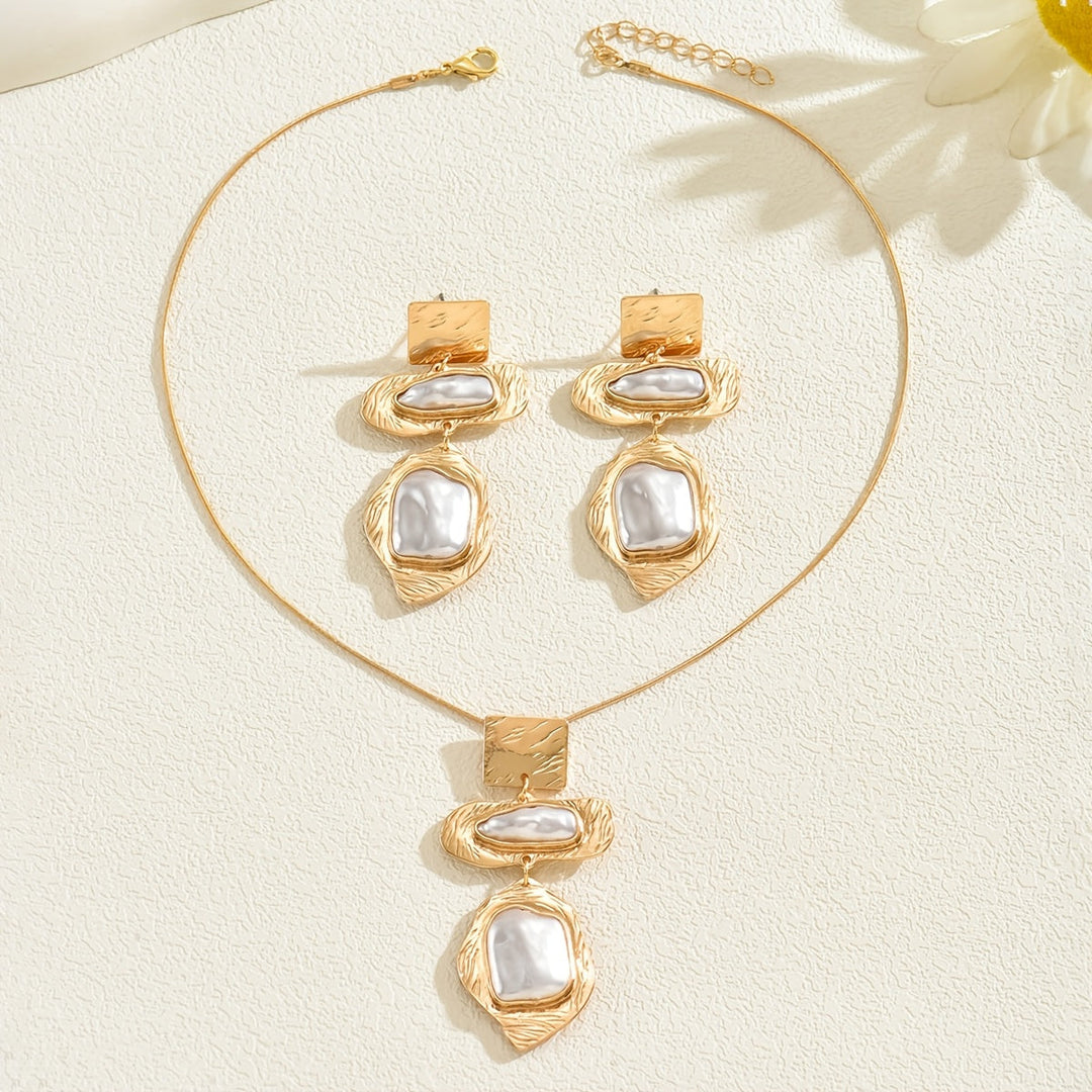Model wearing the pearl mosaic necklace and earrings